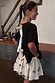 Black Bow Back T-Shirt featuring cream ribbon fastenings on the back and dropped hem shoulders.