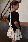 Black Bow Back T-Shirt featuring cream ribbon fastenings on the back and dropped hem shoulders.