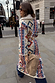 Bridget Maxi Coatigan in blue and orange geometric knit with a detachable wool collar, styled for a London look.