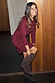 Burgundy knit Sammie Mini Dress with stud neckline detailing, styled with brown suede knee-high boots.
