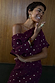 Burgundy Tilly Dress in gold-flecked plisse fabric, designed in London with an off-the-shoulder multi-wear neckline.