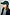 Thumbnail for Navy Tartan NFD Cap featuring blue and green checks and a red embroidered logo, styled with a pinstriped blazer.
