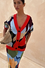Navy Abstract Callie Cardigan featuring a bold artist print, red ribbed trim and button-up front.