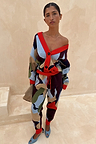 Navy Abstract Callie Cardigan featuring a bold artist print and red trims, styled with matching trousers as a co-ord.