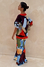 Navy Abstract Callie Cardigan with a bold artist print and red trims, paired with the matching Dorris skirt.