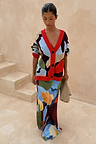 Navy Abstract Callie Cardigan with red trim and artist print, paired with a matching co-ord skirt and clutch.