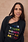 Charcoal sweatshirt featuring colourful "Life is tough honey" embroidery and a functional neckline zip.