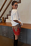 Thumbnail for White cotton Cherry Boob T-Shirt in a boxy relaxed fit, styled with a leopard print lace skirt and black boots.