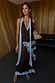 Chocolate brown Lily Skirt in satin with blue lace trim, styled as a co-ord with a matching top.