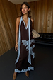 Chocolate brown Lily Skirt in satin with blue lace trim, styled as a co-ord with a matching top.
