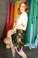 Thumbnail for White Choose Love Cardigan with colourful trims and a chequered skirt on Angela Scanlon in a studio setting.