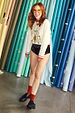 White Choose Love Cardigan with graphic embroidery and red contrast trim, worn by Angela Scanlon.