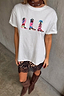 Thumbnail for White cotton Cowboy Boot T-Shirt with multicoloured motifs, styled with a leopard lace skirt and brown boots.
