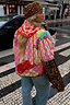 Pink Dallas Reversible Jacket in a quilted fabric with abstract cowgirl motifs, styled for a London look.