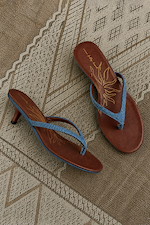 Denim Sandal Mule with slim straps, a low kitten heel and signature sun motif on a brown cushioned sole.