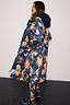 Navy Charm Coat with a hand-painted charm print and a navy borg-lined hood, styled with matching printed leggings.
