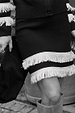 Black and Cream Fringe Jake Skirt in a soft knit with a tiered fringe hem and western-inspired styling.