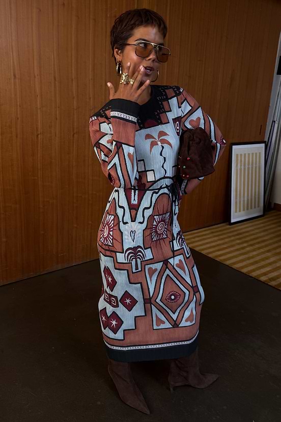 Geometric Gaia Dress in multi-colour pleated plisse with sun and palm motifs and a tie waist detailing.