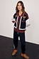 Geometric Knit Cardigan with palm motifs and blanket stitch trim, styled as a co-ord with matching joggers.