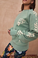 Thumbnail for Sage Sundazed Accessible Sweatshirt with palm prints, HOPE graphic, and concealed zips for treatment access.