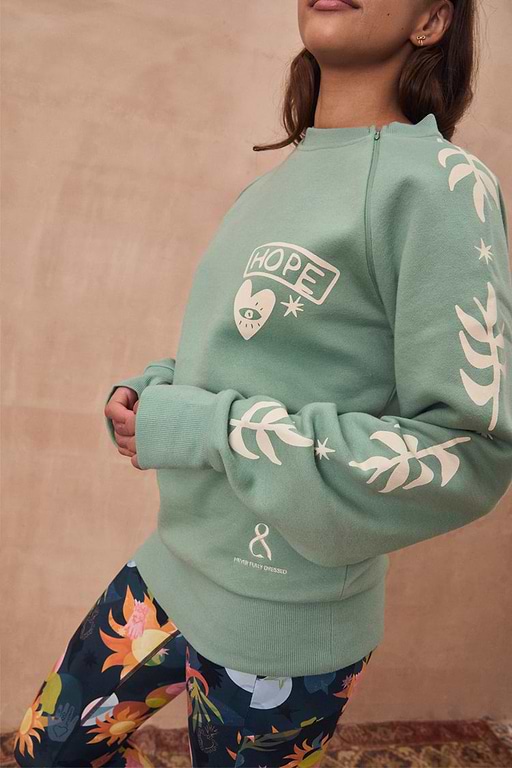 Sage Sundazed Accessible Sweatshirt with palm prints, HOPE graphic, and concealed zips for treatment access.
