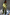 Thumbnail for Khaki Shell Trousers featuring a gold shell print and wide-leg fit, styled as a co-ord set with a matching shirt.