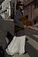 Grey Knit Jumper Dress featuring a cream sheer lace skirt, styled with a brown suede bag for a London street look.