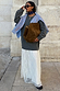 Grey Knit Jumper Dress featuring a sheer white lace skirt, paired with a blue striped shirt and brown suede bag.