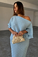 Ice Blue Plisse Tilly Dress with silver flecks and voluminous sleeves, styled with a beaded clutch for inclusive sizing.