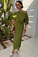 Thumbnail for Khaki Plisse Tilly Dress with gold metallic flecks, a pleated texture and asymmetric neckline in a midaxi length.