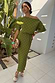 Thumbnail for Khaki Plisse Tilly Dress with gold metallic flecks, featuring a textured finish and an elasticated waist for vacation.
