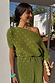 Thumbnail for Khaki Plisse Tilly Dress with gold metallic flecks and an asymmetrical neckline, ideal for summer vacations.