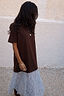 Chocolate Cara T Shirt Dress with a brown cotton top and light blue lace skirt insert, designed in London.