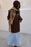 Thumbnail for Chocolate Cara T Shirt Dress with a blue lace hem, styled with a leopard print clutch and draped camel cardigan.