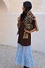 Chocolate Cara T Shirt Dress featuring a brown cotton top and blue lace skirt, paired with a leopard print bag.