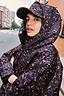 Thumbnail for Dark Leopard Cap in iconic burgundy leopard print, styled with a matching hooded jacket for a casual London look.