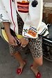 Leopard Lucia Scallop Pocket Long Shorts in denim, styled with a Mallorca cardigan, lemon clutch and red slides.