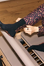 Black cotton crew-length NFD socks with leopard print accents, styled with matching leggings in a gym setting.