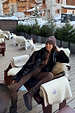 Leopard Thermal Leggings in iconic animal print worn as a ski base layer in a snowy outdoor resort setting.