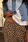 Lucia Leopard Elissa Trousers detail highlighting the elasticated drawstring waist and iconic leopard print.