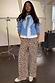 Thumbnail for Iconic leopard print Lucia Elissa Trousers with a wide-leg fit, styled with a blue jacket and matching scarf.