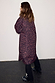 Dark Leopard Rain Mac in iconic leopard print and relaxed fit, shown from the back on a model.