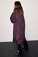 Dark Leopard Rain Mac in iconic leopard print and relaxed fit, shown from the back on a model.