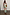 Thumbnail for Pastel Morocco Mesh Vivi Dress featuring multi-coloured block prints with sun, eye and palm motifs on a model.