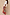 Thumbnail for Morocco Beaded Bag with hand beaded abstract patterns and silver accents, styled with a matching colourful maxi skirt.