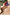 Thumbnail for Blue and red Holly Cardigan with sun motifs, styled with a tan suede mini Jaspre skirt and brown boots.