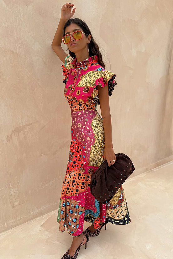 Morocco Remi Dress featuring an abstract patchwork print, pleated frill neckline and ruffled sleeves.