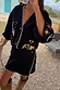Black Night Garden Mini Wrap Skirt with pink blanket stitch and night garden motifs, styled as a matching co-ord.