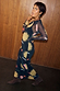 Thumbnail for Black Mystical Mesh Dress featuring celestial sun and moon motifs on a sheer long-sleeved midaxi silhouette.