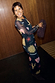 Black Mystical Mesh Dress featuring celestial sun and moon prints on a sheer long-sleeved midaxi silhouette.